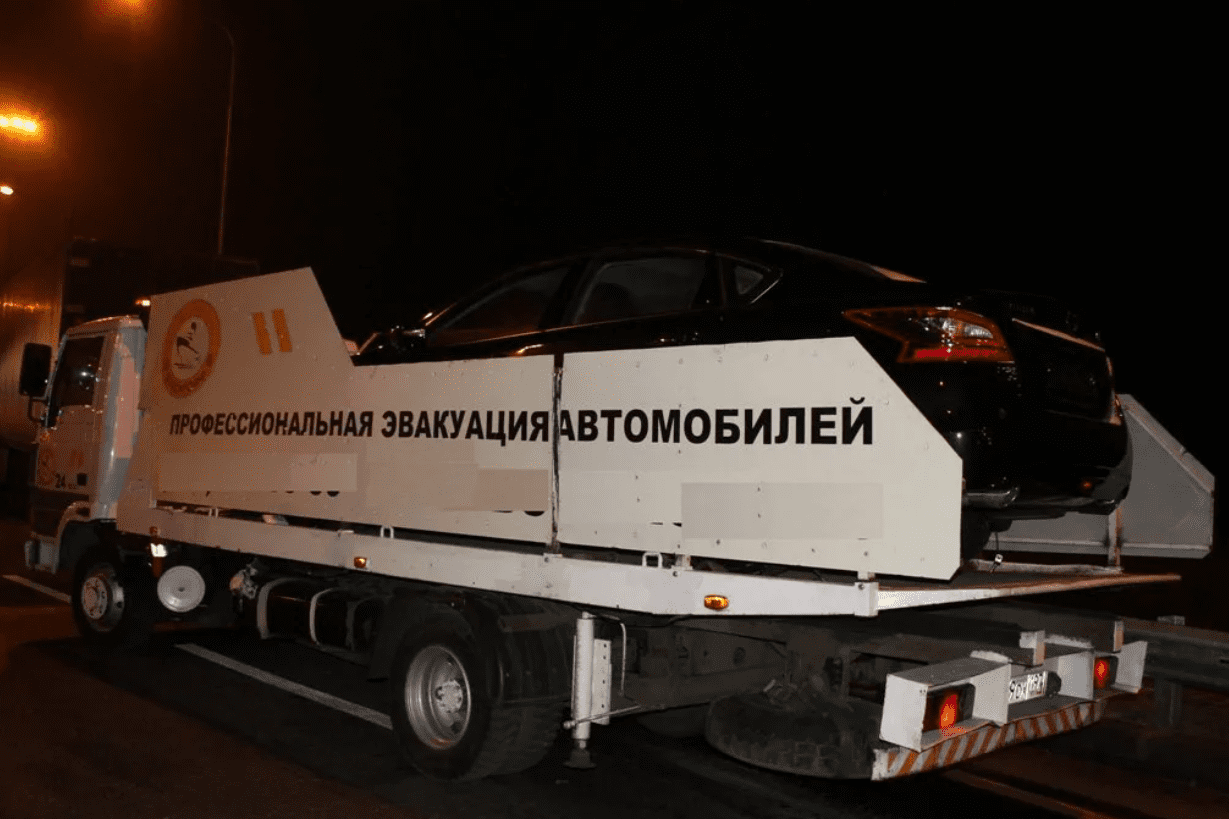 Эвакуатор полукрытый с высокими бортами